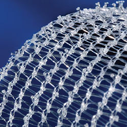 This image shows an extreme close up of hernia mesh, the material used as a scaffold to encourage the body to repair a hernia