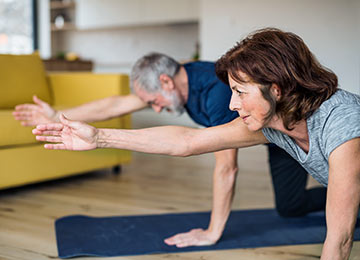 Image showing two patients exercising following hernia surgery
