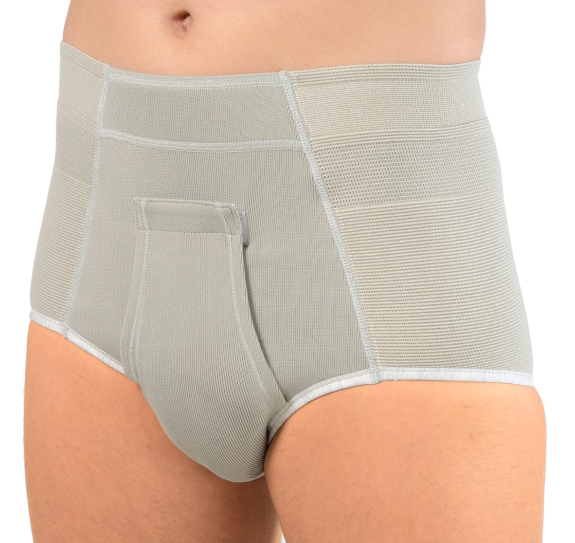 A man wearing grey hernia support underwear which help manage symptoms of groin hernias and sports hernias/Gilmore's groin.