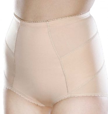 A model wearing beige hernia pants, designed to support women who have had or are awaiting groin female hernia surgery.